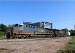 CSX 254 leads train L619-10 around the curve at Raleigh Tower